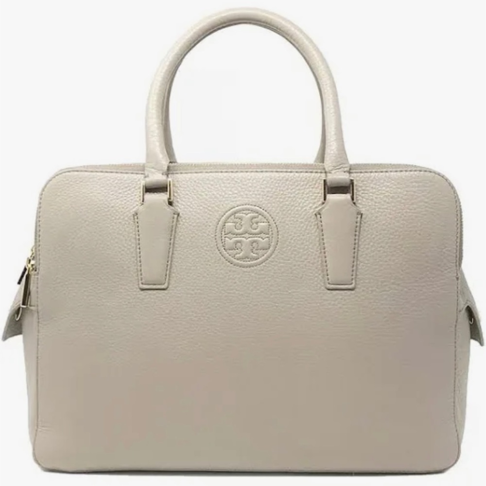 Tory Burch Pebbled leather Marion triple zipper top handle bag.